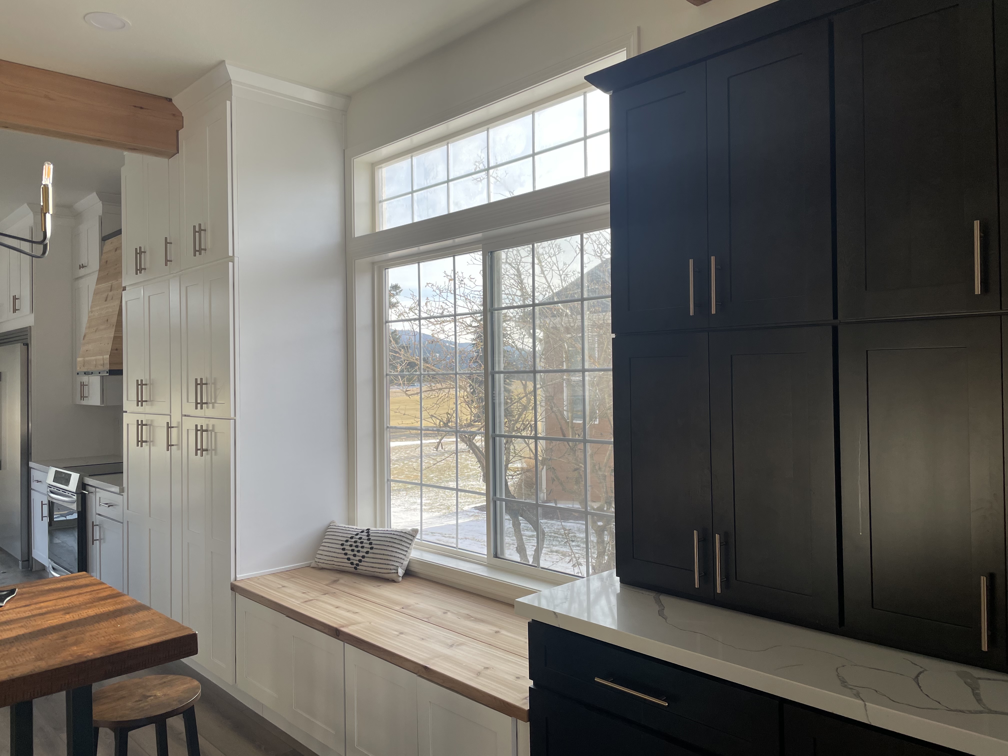 Window seat and tall cabinets